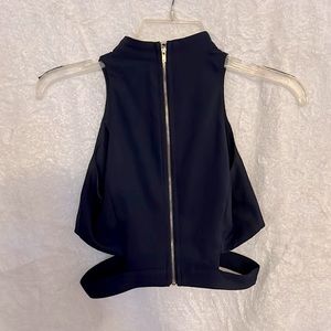 Fashion Nova zip up crop top, size small and in the color dark navy blue.
